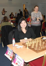 Баира Кованова совершила досадную ошибку и привела к поражению в партии и матче против китайской шахматистки Хван Кван